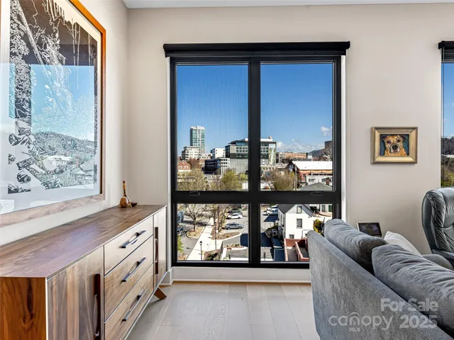 a living room with furniture and window