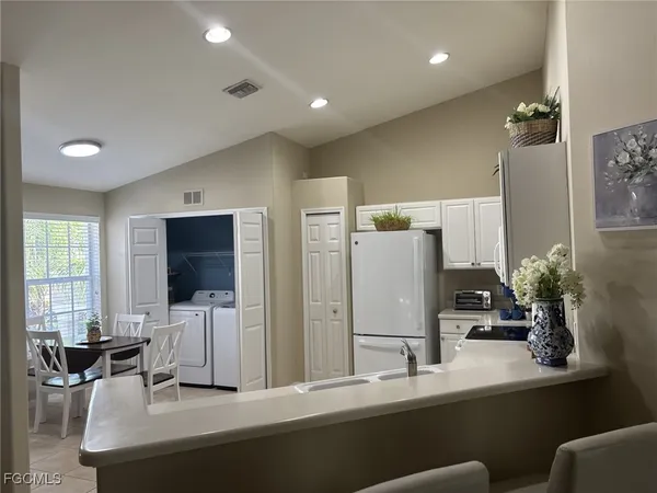 a room with furniture and a flat screen tv