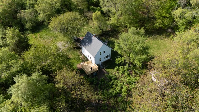 a view of a bench in a garden