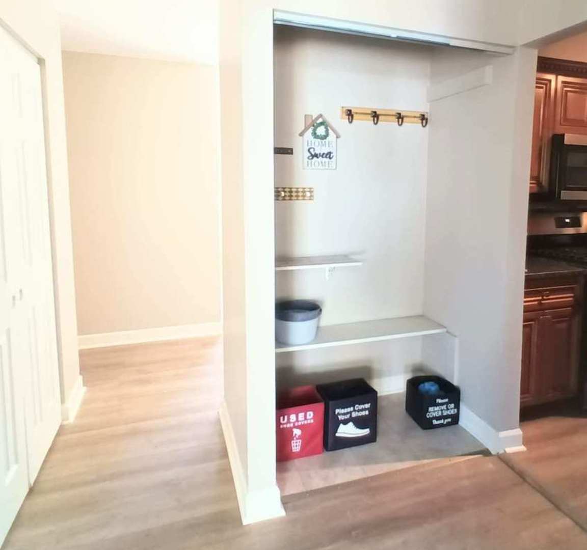 117 Kingston Road Bolingbrook, IL 60440 - Photo 15 of 24 a view of an entryway with rack