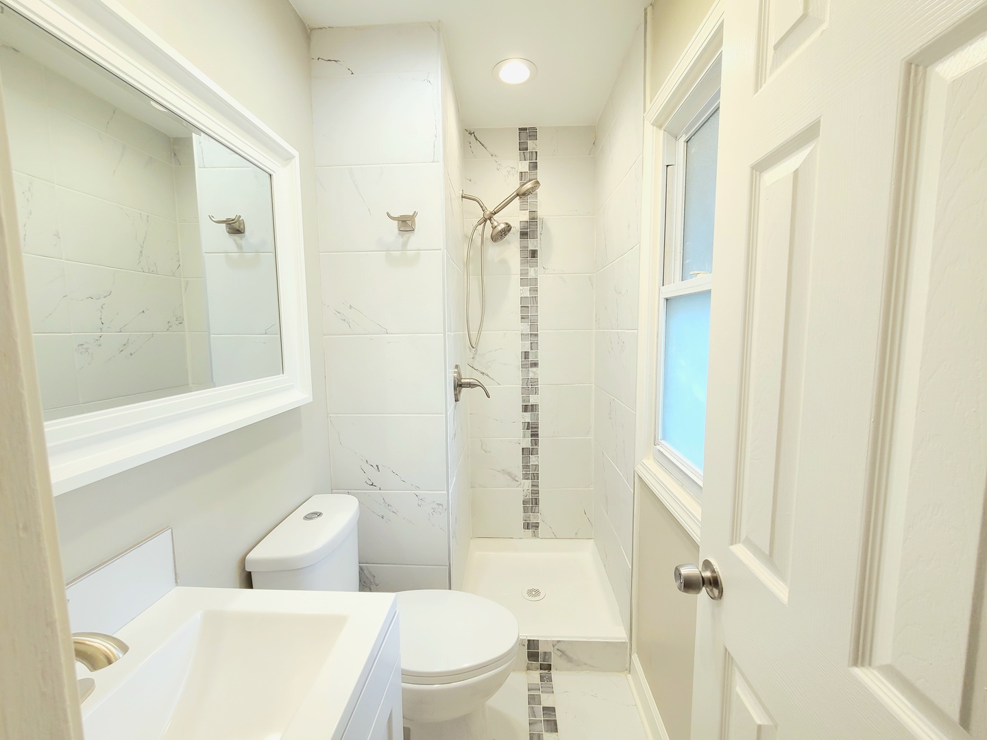 117 Kingston Road Bolingbrook, IL 60440 - Photo 6 of 24 a bathroom with a sink toilet and shower