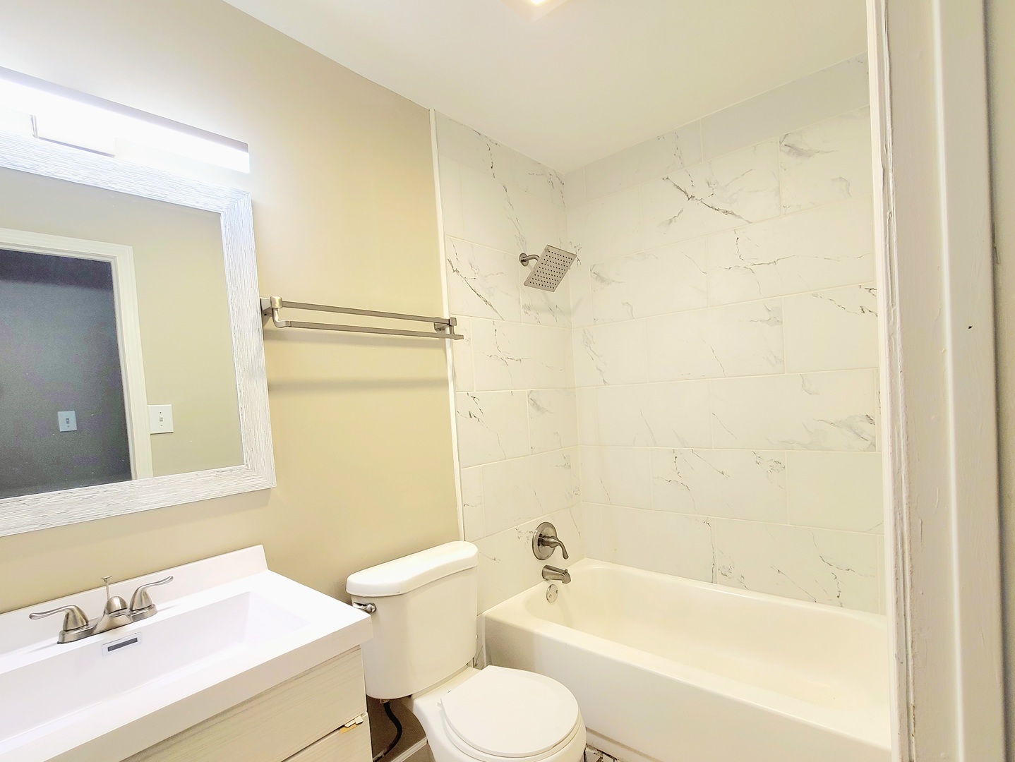 117 Kingston Road Bolingbrook, IL 60440 - Photo 7 of 24 a bathroom with a sink toilet and shower