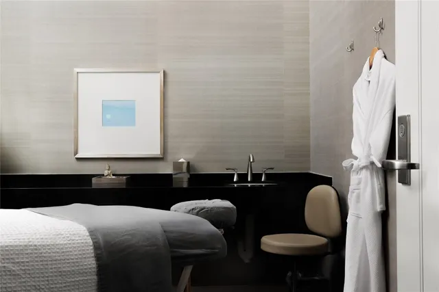 a swimming pool with outdoor seating and yard