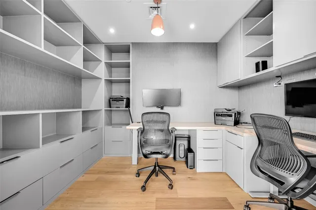 a view of a workspace with furniture