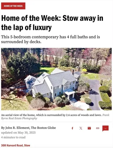 a aerial view of a house with a yard and outdoor seating