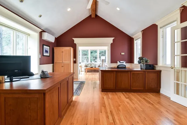 a workspace with furniture and a window