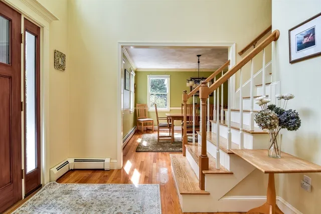 a open kitchen with stainless steel appliances granite countertop a stove and refrigerator