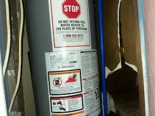 with sign on a rack next to a window