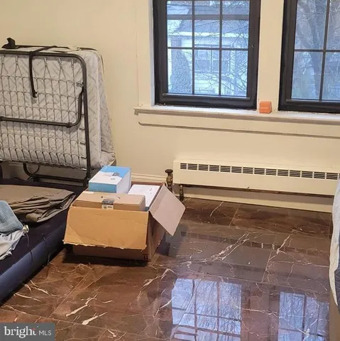 a kitchen with a sink cabinets and appliances