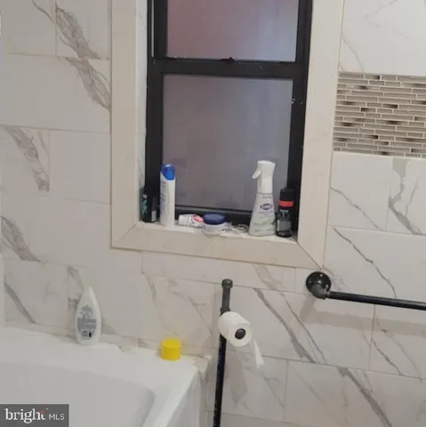 a bathroom with a tub