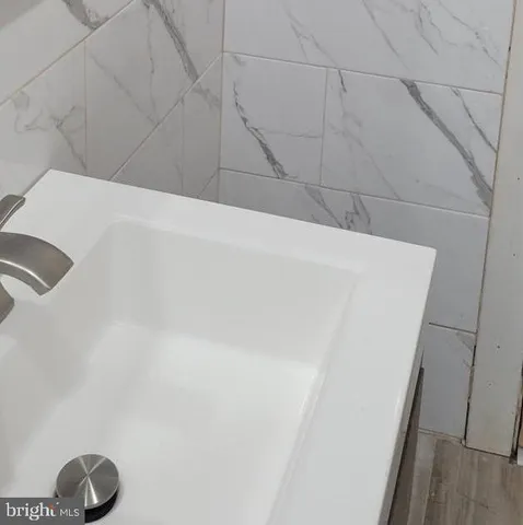 a room with a bed and a window