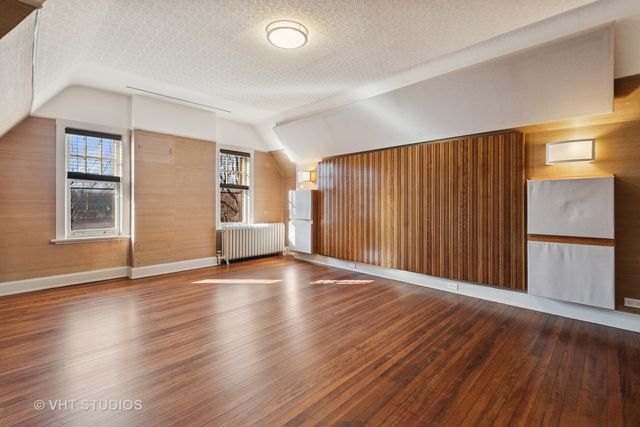 a picture of door with a white and white wall