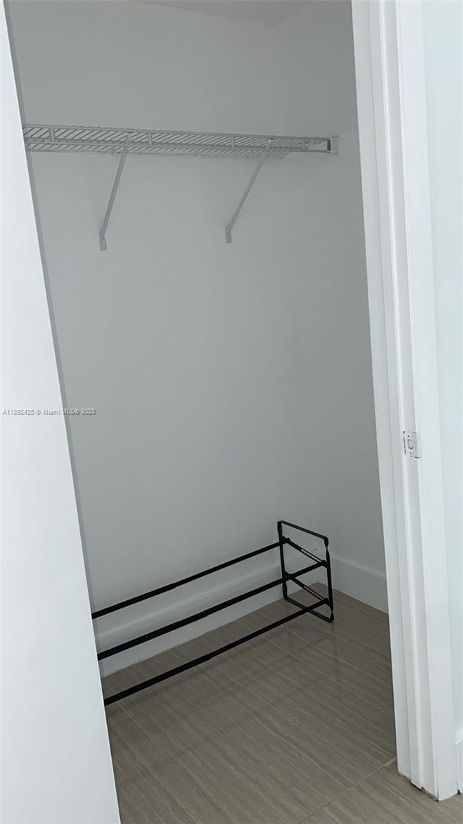 90 Southwest 3rd Street, Unit 3907 Miami, FL 33130 - Photo 17 of 31 a view of an empty walk in closet