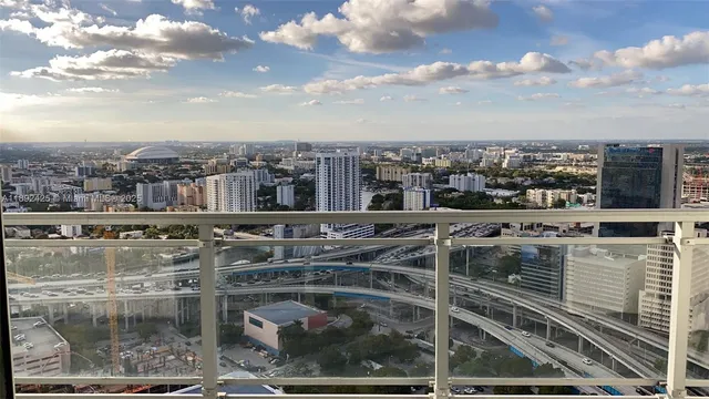 a view of a city with tall buildings