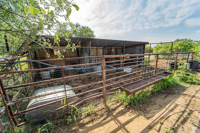 a view of backyard with green space