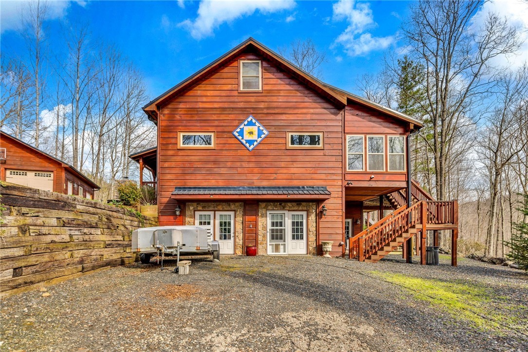 7994 3 Top Road Todd, NC 28684 - Photo 45 of 50 a view of a house with wooden fence