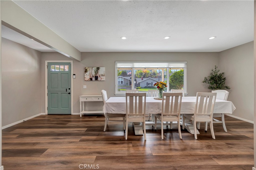 16243 Summershade Drive La Mirada, CA 90638 - Photo 16 of 34 a view of a dining room with furniture window and wooden floor