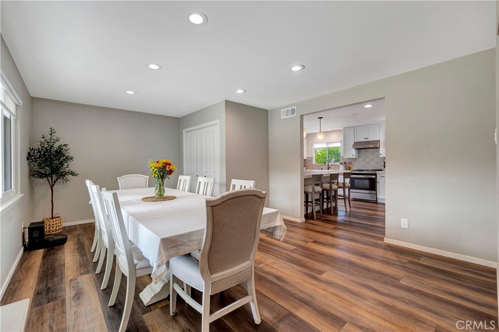 16243 Summershade Drive La Mirada, CA 90638 - Photo 20 of 34 a dining room with furniture and wooden floor
