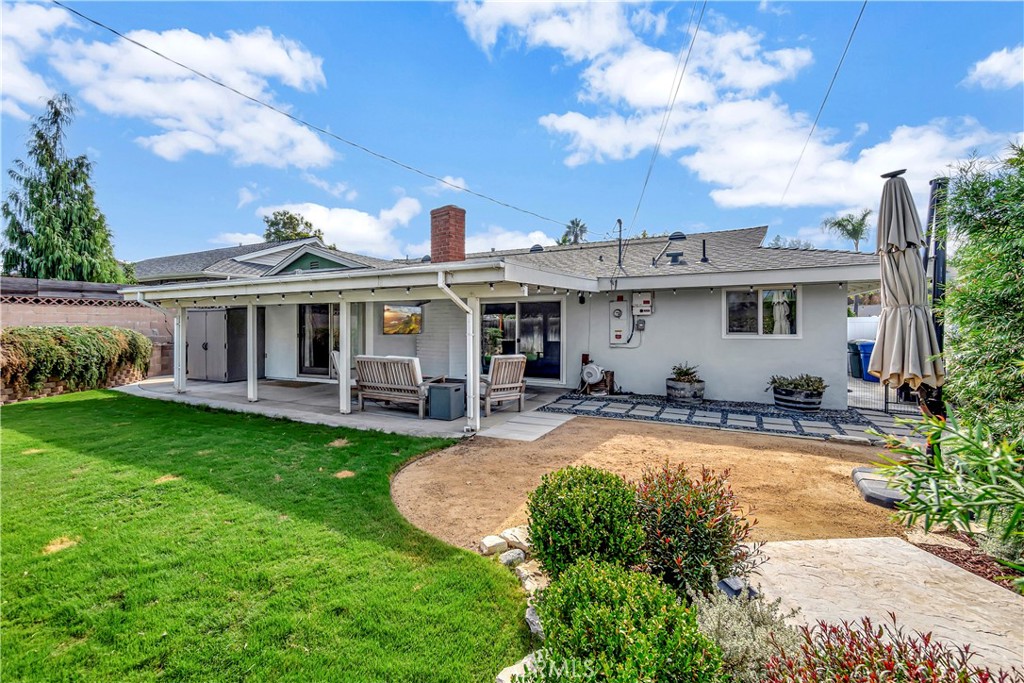 16243 Summershade Drive La Mirada, CA 90638 - Photo 29 of 34 a view of a house with swimming pool and sitting area