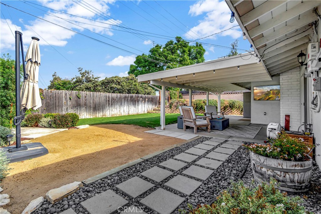 16243 Summershade Drive La Mirada, CA 90638 - Photo 31 of 34 a view of a backyard with plants and a patio