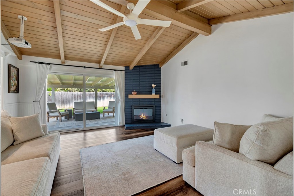 16243 Summershade Drive La Mirada, CA 90638 - Photo 5 of 34 a living room with furniture and a fireplace