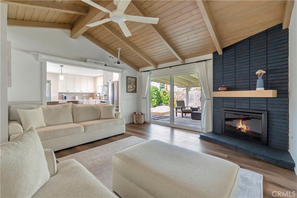 16243 Summershade Drive La Mirada, CA 90638 - Photo 6 of 34 a living room with furniture and a fireplace