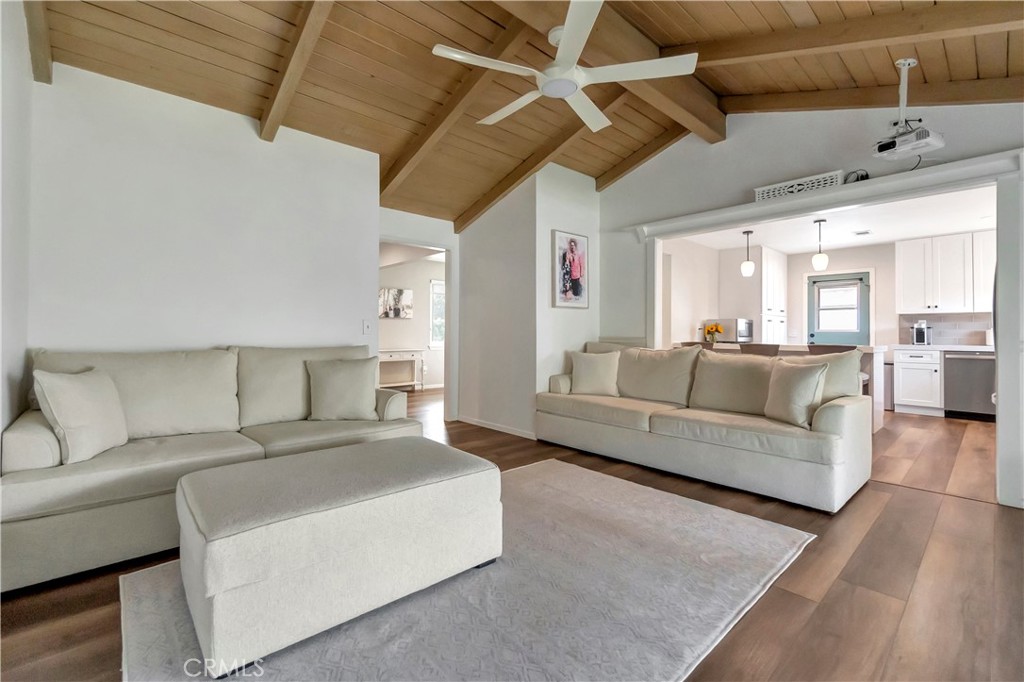 16243 Summershade Drive La Mirada, CA 90638 - Photo 7 of 34 a living room with furniture and a chandelier