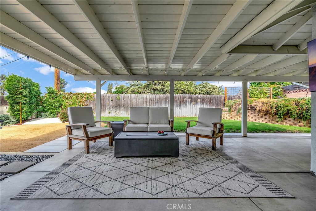 16243 Summershade Drive La Mirada, CA 90638 - Photo 8 of 34 a outdoor space with patio the couches and a dining table with the garden view