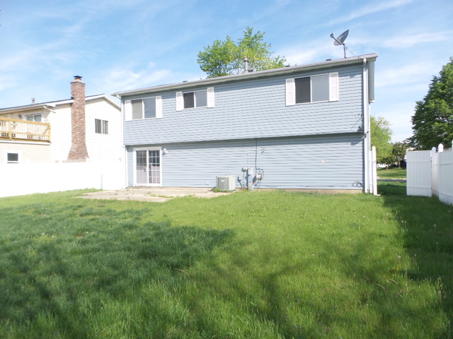 176 Grady Drive Bolingbrook, IL 60440 - Photo 29 of 30 a front view of a house with a yard