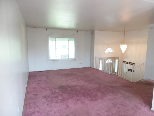 176 Grady Drive Bolingbrook, IL 60440 - Photo 8 of 30 a view of an empty room with a window