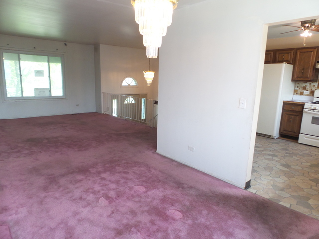 176 Grady Drive Bolingbrook, IL 60440 - Photo 9 of 30 a view of a room that has a window