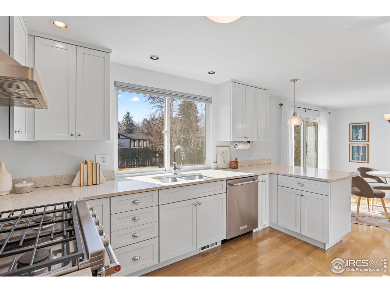 4302 Apple Way Boulder, CO 80301 - Photo 13 of 38 a kitchen with a sink stove and cabinets