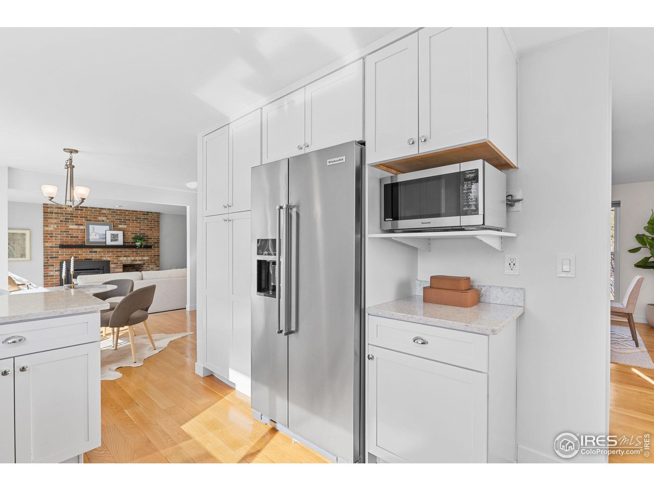 4302 Apple Way Boulder, CO 80301 - Photo 17 of 38 a kitchen with stainless steel appliances a refrigerator stove and microwave