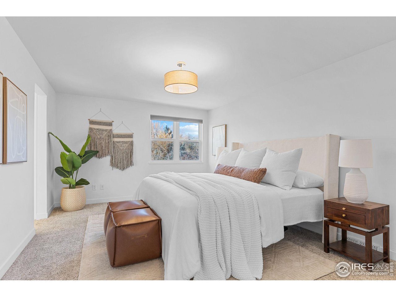 4302 Apple Way Boulder, CO 80301 - Photo 20 of 38 a bedroom with a bed and a window