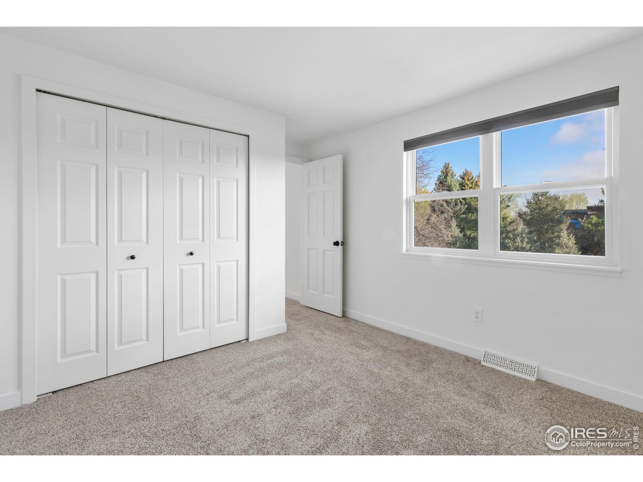 4302 Apple Way Boulder, CO 80301 - Photo 34 of 38 a view of an empty room with a window