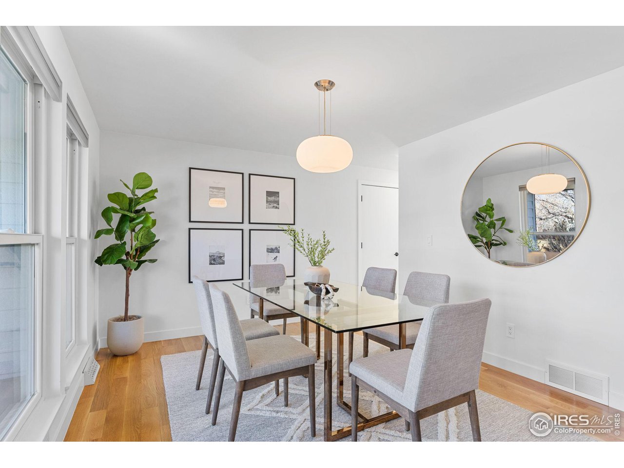 4302 Apple Way Boulder, CO 80301 - Photo 5 of 38 a view of a dining room with furniture and wooden floor