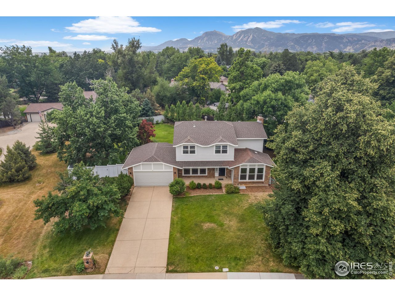 4302 Apple Way Boulder, CO 80301 - Photo 7 of 38 a aerial view of a house with a garden