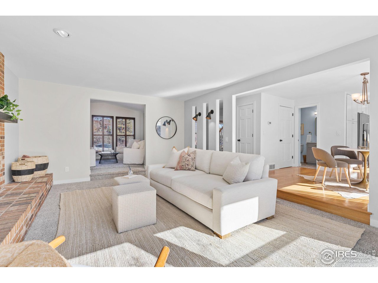 4302 Apple Way Boulder, CO 80301 - Photo 9 of 38 a living room with furniture and a wooden floor