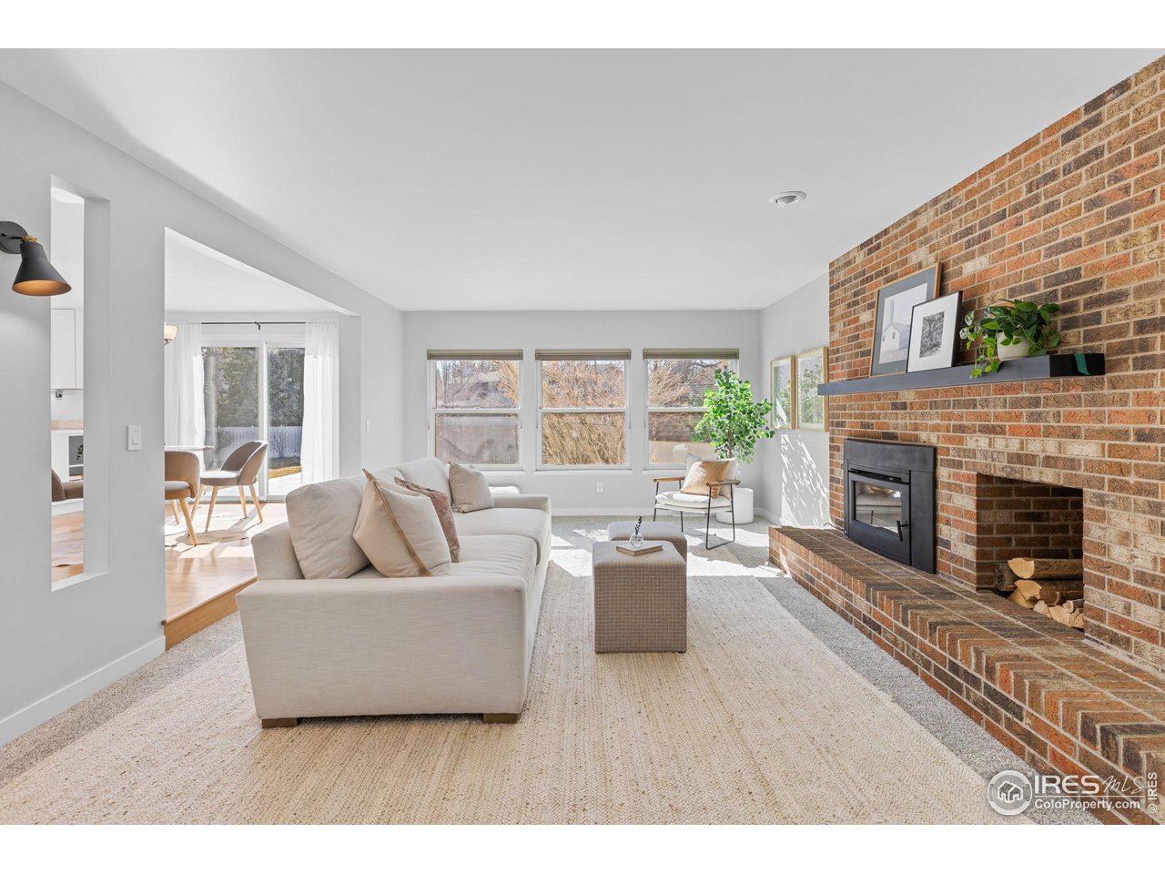 4302 Apple Way Boulder, CO 80301 - Photo 10 of 38 a living room with furniture and a fireplace