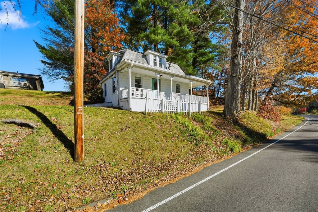 196 Pendleton Avenue Chicopee, MA 01020 - Photo 22 of 22 a view of a house with a small yard and large tree