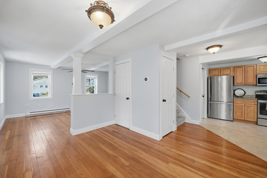 196 Pendleton Avenue Chicopee, MA 01020 - Photo 7 of 22 a view of empty room with wooden floor