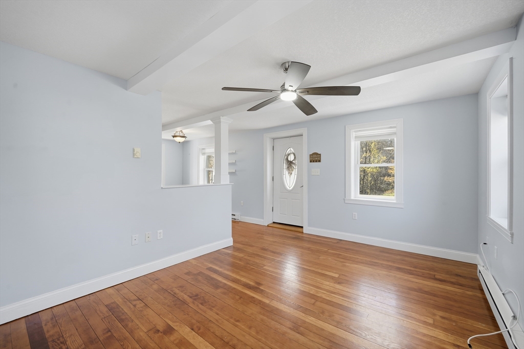 196 Pendleton Avenue Chicopee, MA 01020 - Photo 9 of 22 wooden floor in an empty room with a window