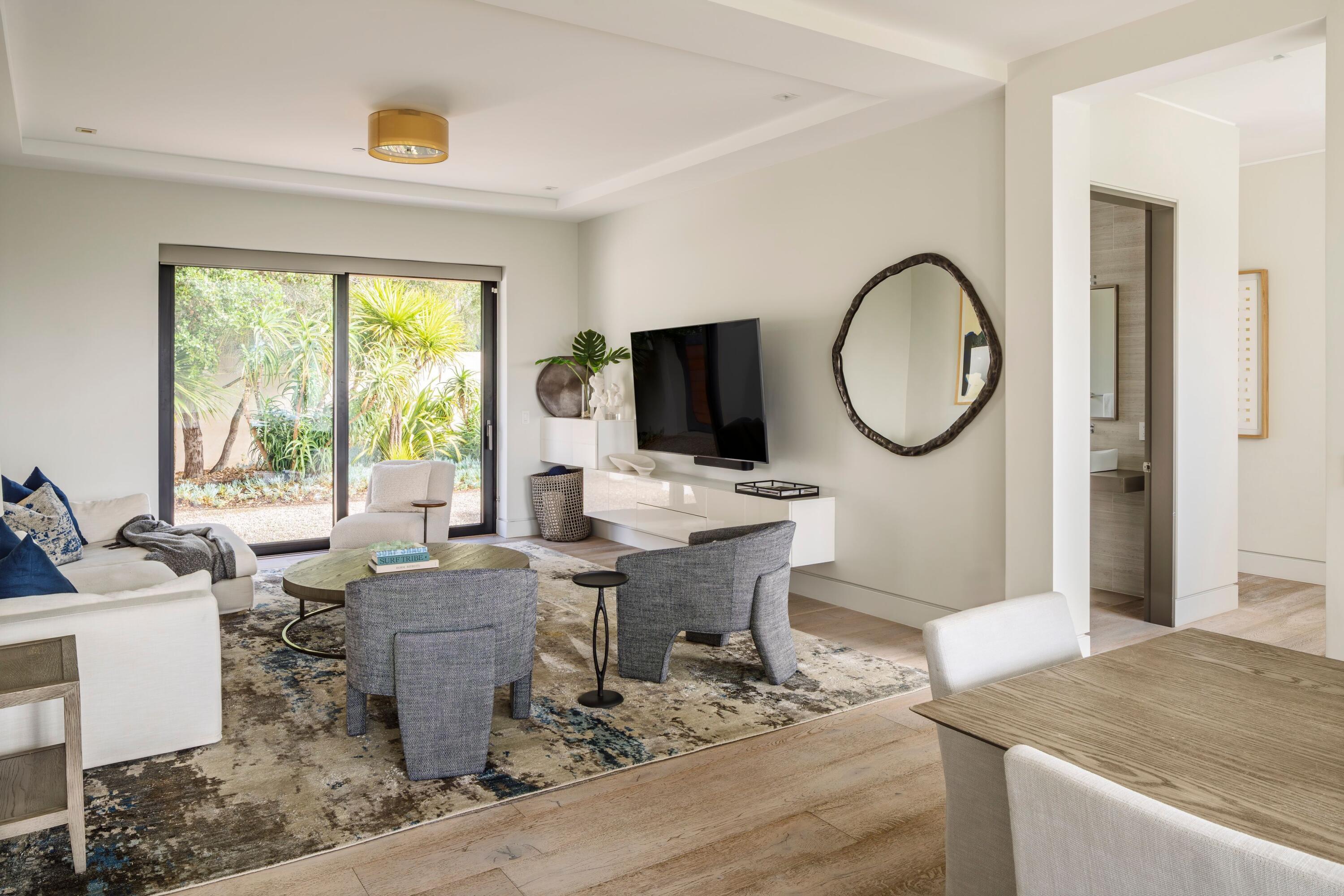1131 Las Alturas Road, Unit A Santa Barbara, CA 93103 - Photo 14 of 47 13. Dining Room with White Chairs and Pa