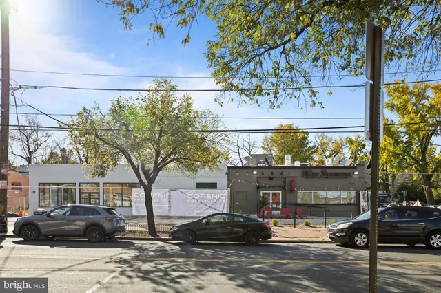 a view of a bathroom with mirror