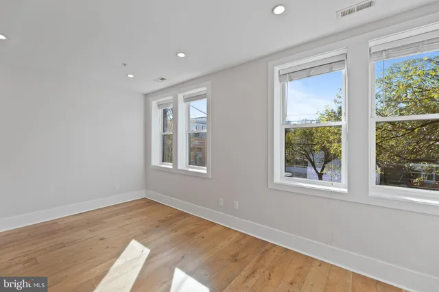 a view of a living room and a window