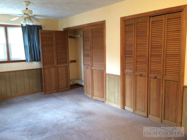 39 Painter Road Banner Elk, NC 28604 - Photo 4 of 17 an empty room with windows