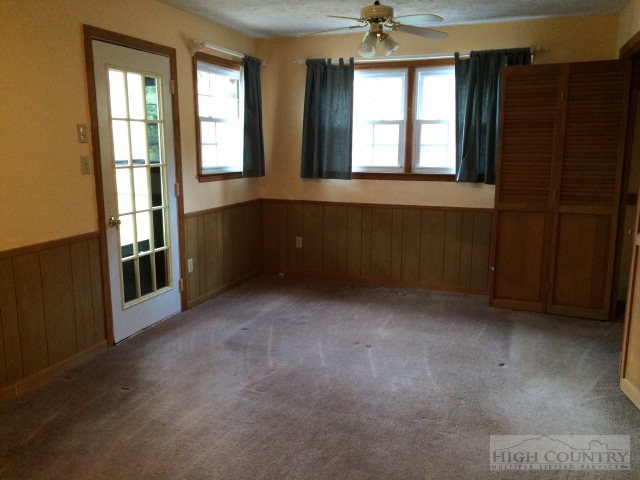 39 Painter Road Banner Elk, NC 28604 - Photo 5 of 17 an empty room with windows