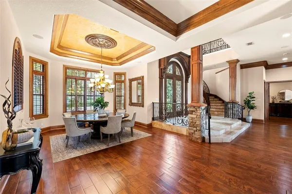 a kitchen with stainless steel appliances granite countertop a stove a washer and dryer