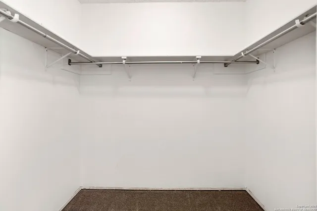 a view of small space with racks on the wall