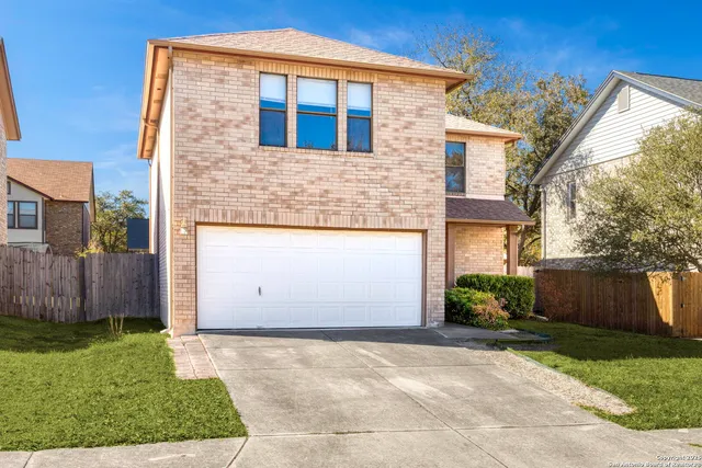 a front view of house with yard